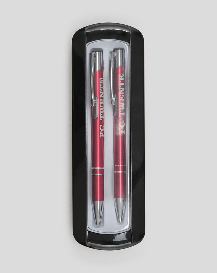 Two red FC Twente pens with silver tips in a black plastic pen case