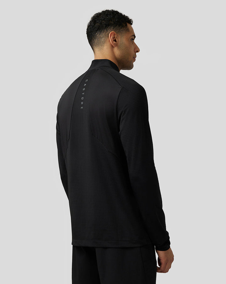 Back view of a black Apex Aeromesh top with reflective branding along the spine