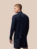 Back view of navy Adapt Training top showing vertical Castore branding on the upper back and the AERTEK label at the hem.