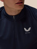 Navy Adapt Training 1/4 Zip top close up showing front zipper and Castore logo on the chest