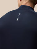 Back view of navy Adapt Training top with vertical Castore logo along the upper back