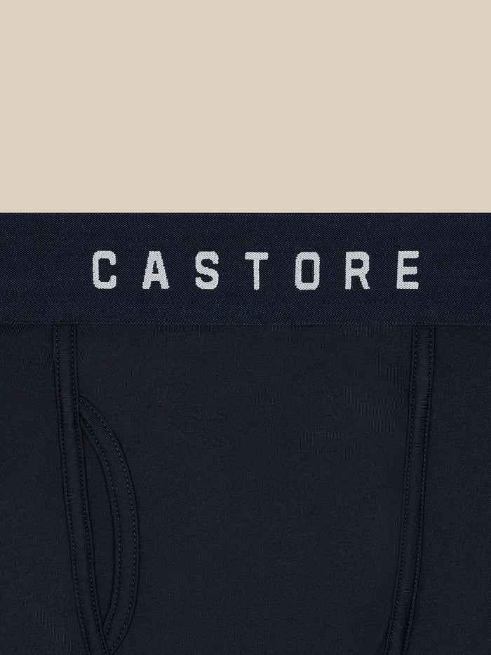 Close-up of navy boxer briefs with a Castore branded waistband.