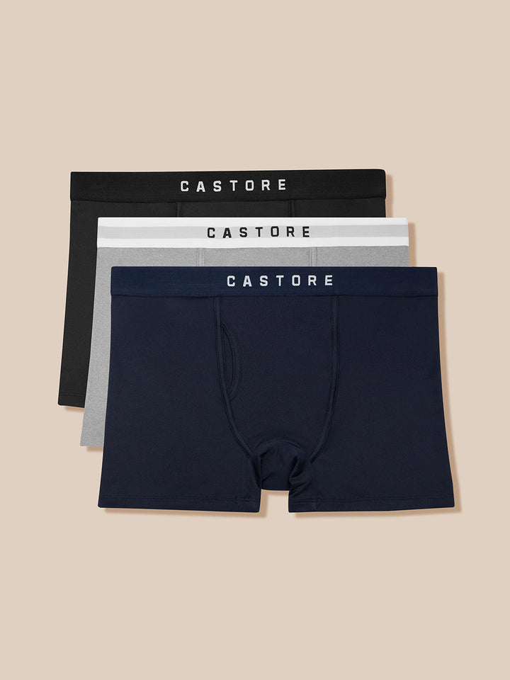 Three-pack Castore boxer briefs in black grey and navy with branded waistbands.