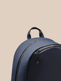 Partial close up of the Active Backpack Navy zipper pocket with a Castore branded zipper pull.