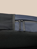 Close-up of navy Active Backpack highlighting padded back, mesh lower panel and grey zipper pulls