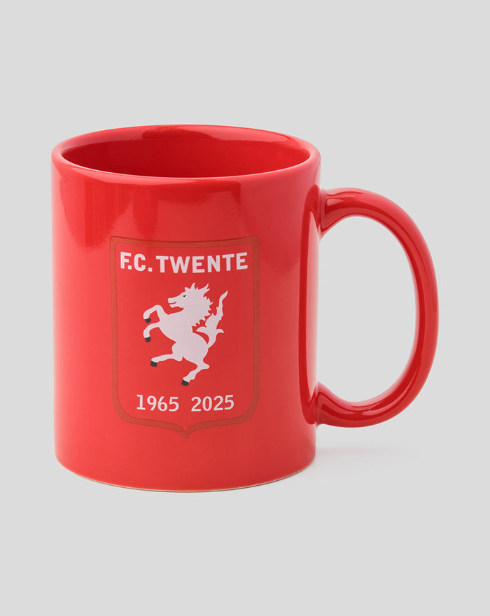 Red FC Twente jubileum mug with crest and handle, presented beside a red gift box.