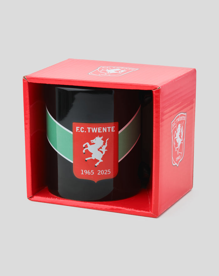 Mug nestled inside a red packaging box with crest on the lid