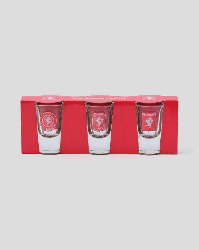 Set of three clear shot glasses with an FC Twente crest in red packaging.
