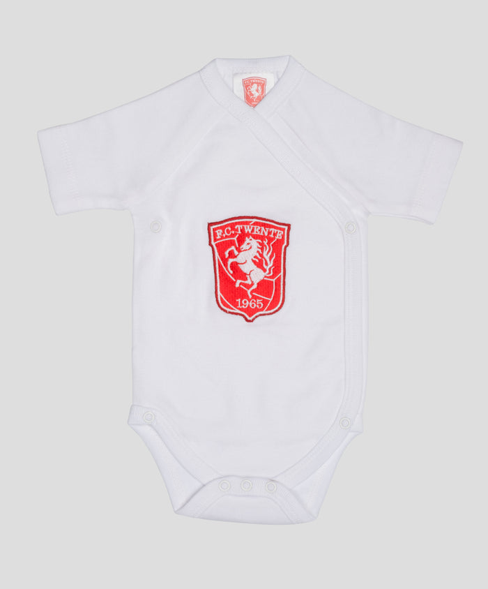White baby romper with red FC Twente crest on the chest
