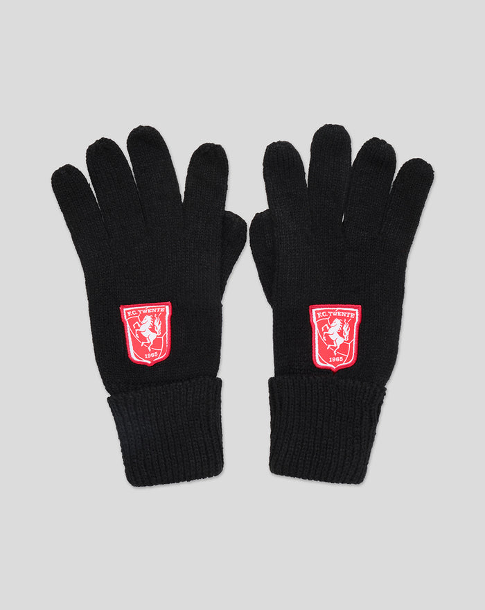 Pair of black knitted gloves with a red FC Twente crest patch on the cuff