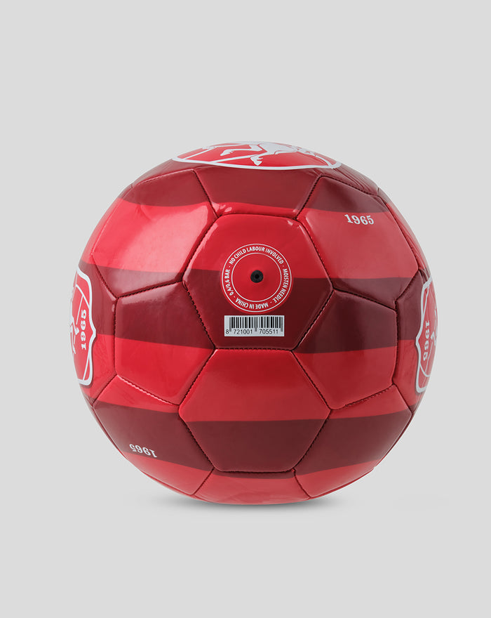 Side view of red FC Twente football displaying a large white crest and 1965