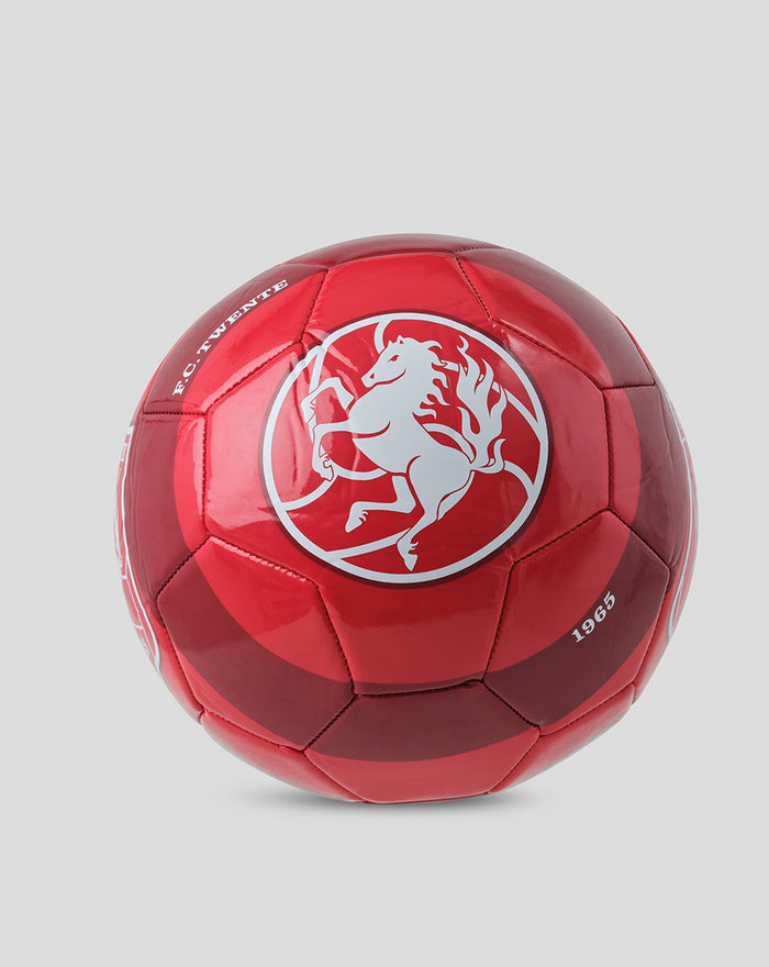 Angled view of red FC Twente football with a white crest and 1965 marking
