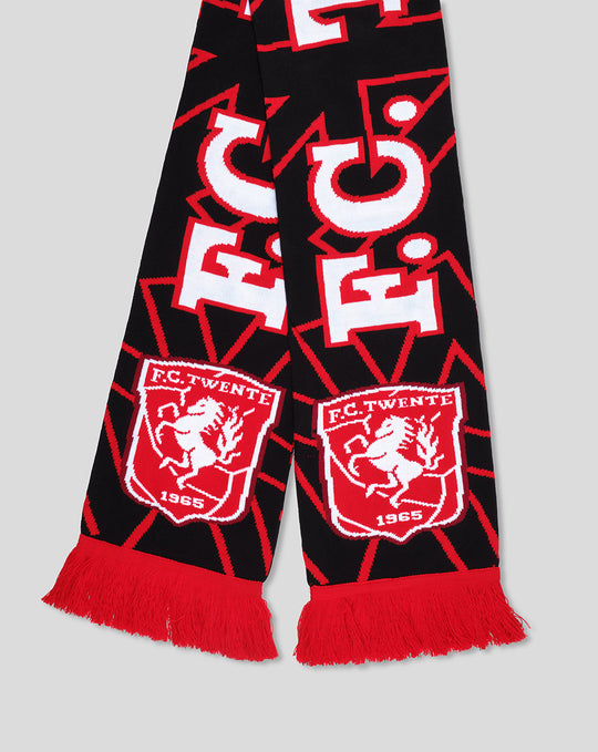 Close up of FC Twente Away scarf showing crest patches and red fringe along the ends.