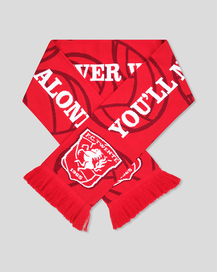 Folded red FC Twente scarf with white lettering YOU'LL NEVER WALK ALONE and crest patches at the ends
