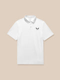 Front view of a white textured golf polo with a Castore logo on the left chest.