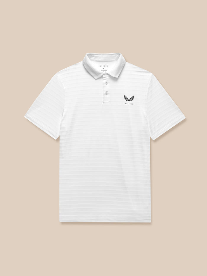 Front view of a white textured golf polo with a Castore logo on the left chest.