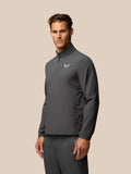 Heren Golf Lange Mouw Flex Gewoven Top Gunmetal met opstaande kraag en halve ritssluiting; Castore-logo op borst en mouw.
