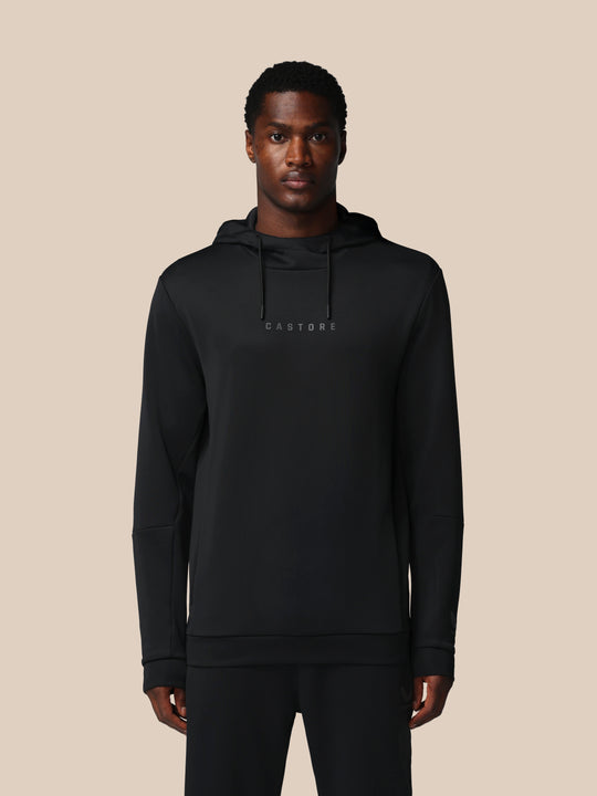 Front view of black Castore Flex hoodie with chest CASTORE logo and adjustable three piece hood.