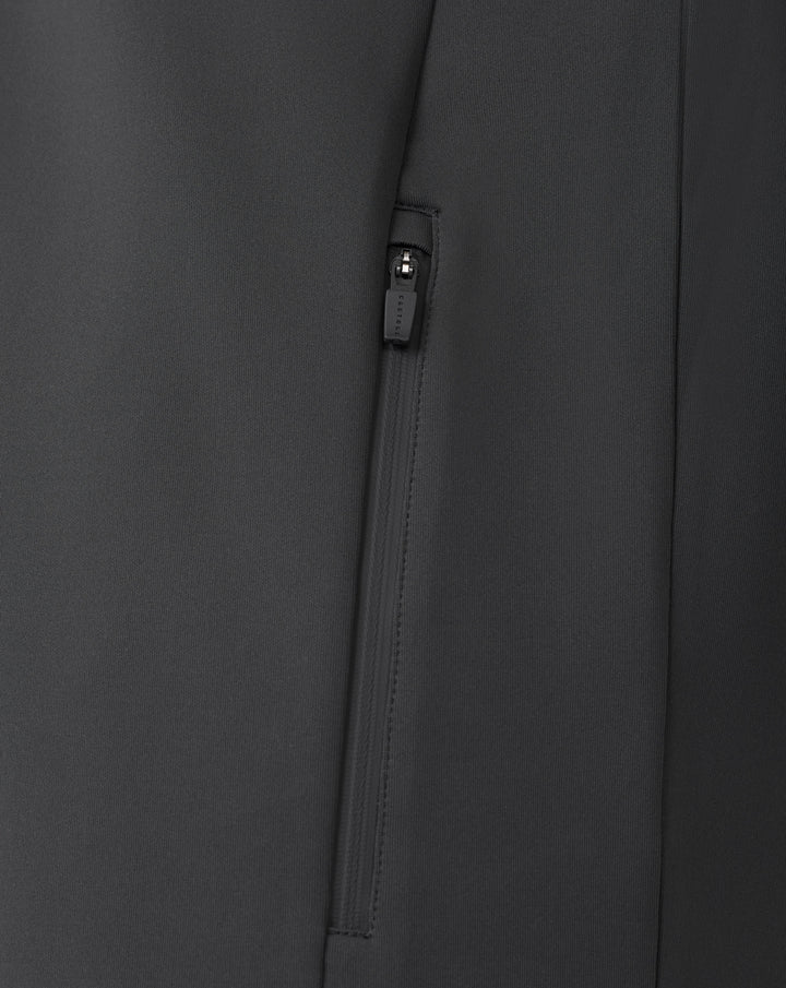 Close up of a zip pocket on dark gunmetal Castore sweatshirt fabric.