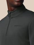 Close-up of the high collar and chest area with Castore logo on the left chest