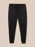 Zwarte Heren Flex Joggers met elastische tailleband, buitenkoord en zakken met rits; Castore-logo op linker dij.