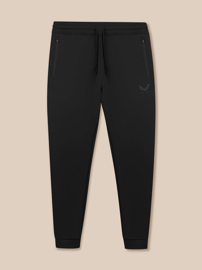 Zwarte Heren Flex Joggers met elastische tailleband, buitenkoord en zakken met rits; Castore-logo op linker dij.