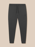 Front view of Gunmetal Heren Flex Joggers with elastic waistband drawcord and zip pockets and Castore logo on left thigh.