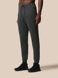 Men's Flex Joggers Gunmetal with ProTek water resistance, elastic waist with external drawcord, zip pockets, Castore logo on left thigh
