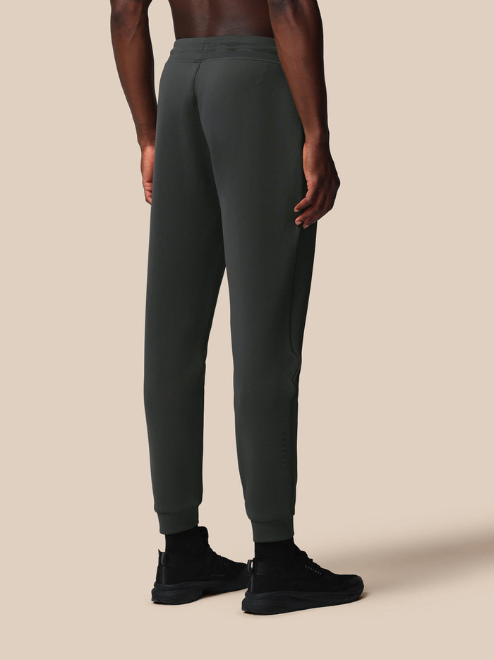Back view of men's gunmetal Flex Joggers with smooth waistband and clean silhouette