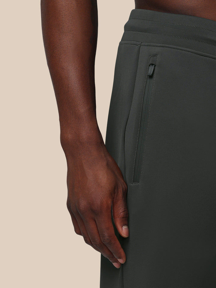 Close up of zippered side pocket on men's gunmetal Flex Joggers showing durable zipper and alignment