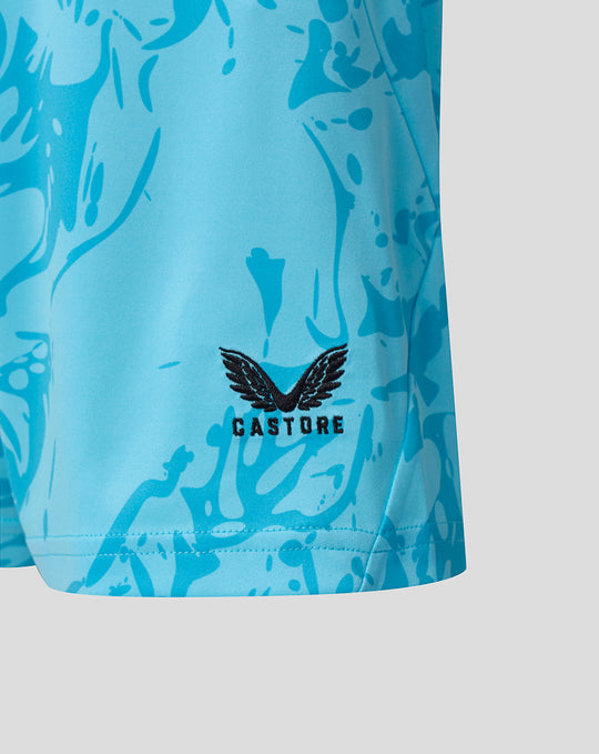 Blue keeper shorts leg showing Castore branding and wing emblem