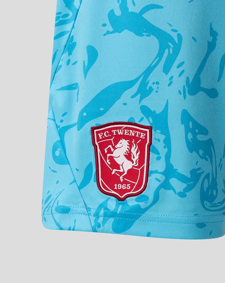 Close up of blue FC Twente keeper shorts with red crest patch