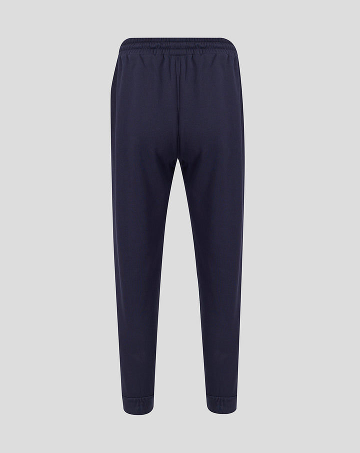 Back view of navy FC Twente Travel Adapt fleece joggers for men with an elastic waistband and ribbed cuffs.