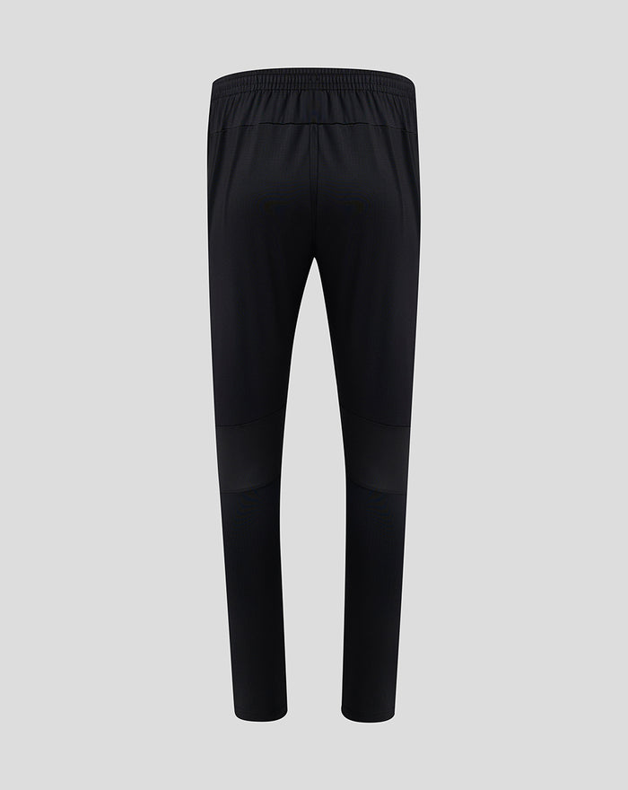 Back view of black FC Twente training pants with elastic waistband and streamlined design.