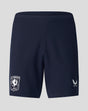 Back view of navy blue FC Twente shorts with pockets, crest on left leg and Castore logo on right leg