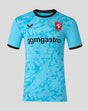 Front view of a bright blue FC Twente keeper shirt with black collar, crest on the chest, Castore logo and ggmastro sponsor.