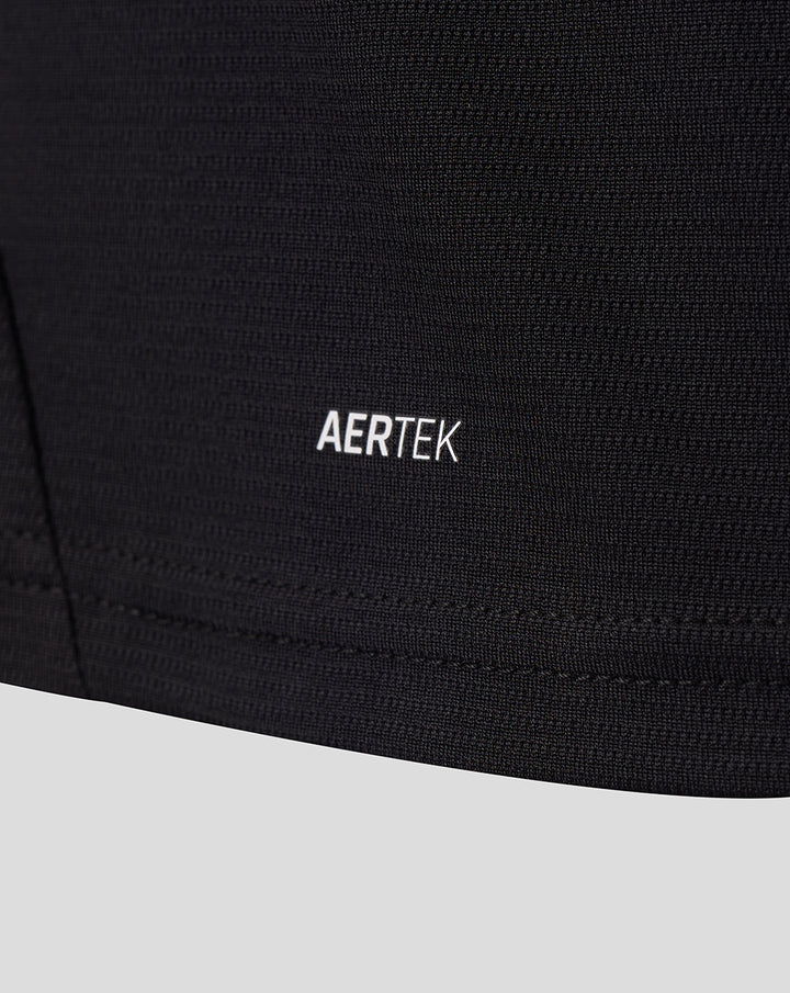 Close-up of black fabric on FC Twente away shirt highlighting the AERTEK label.