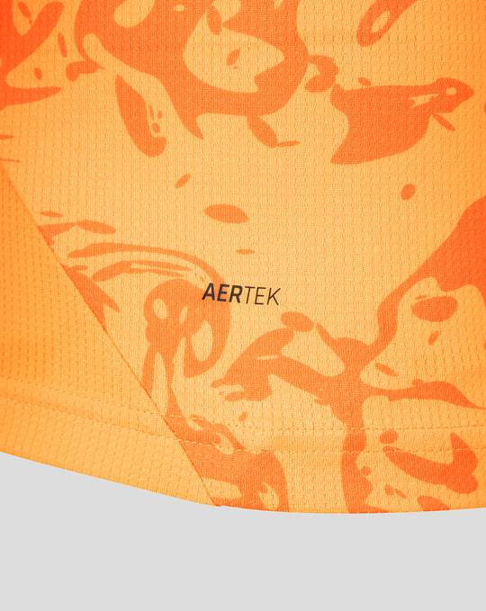 Close up of orange FC Twente keeper shirt showing AERTEK branding on the hem area.