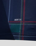 Close-up of navy FC Twente Vierde Shirt fabric showing tartan plaid stripes and AERTEK branding