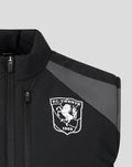 Close-up of the front left chest showing the FC Twente crest on a black training gilet with a zipper.