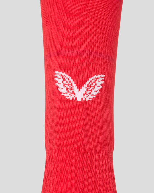 Red FC Twente footless home sock knit texture with a white logo visible on the lower leg