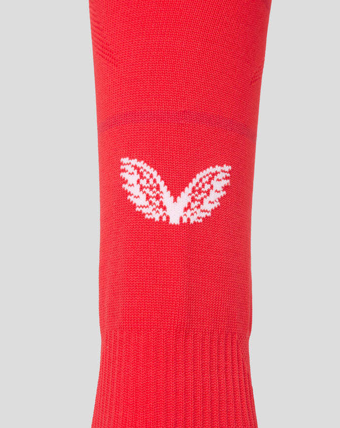 Red FC Twente footless home sock knit texture with a white logo visible on the lower leg