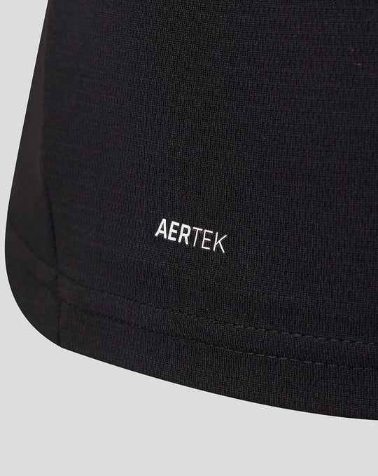 Close up of black FC Twente 26/27 women's away shirt fabric with AERTEK branding near the hem