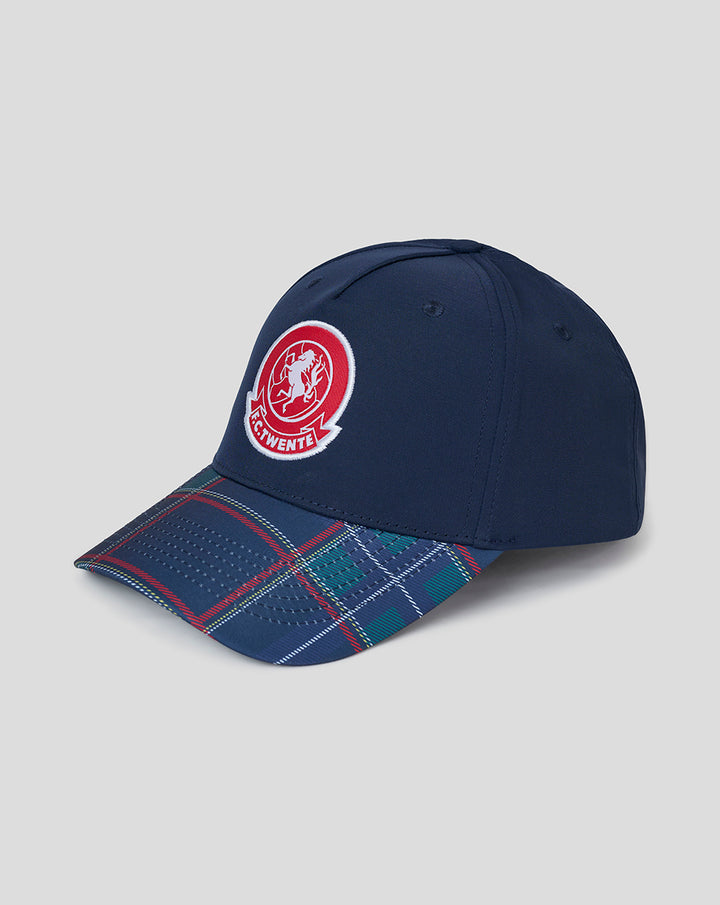 Navy blue FC Twente cap with circular crest on the front and tartan plaid brim