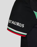 Close up of black women's FC Twente third shirt sleeve with Taurus branding and red white green trim.