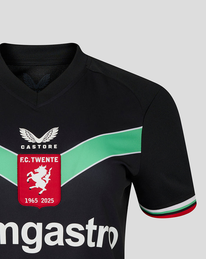 Close-up of the black women's FC Twente third shirt showing the crest and green chevron across the chest