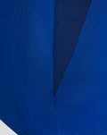 Closeup of blue textured fabric and panel details from the FC Twente Pro Coach Training Shirt