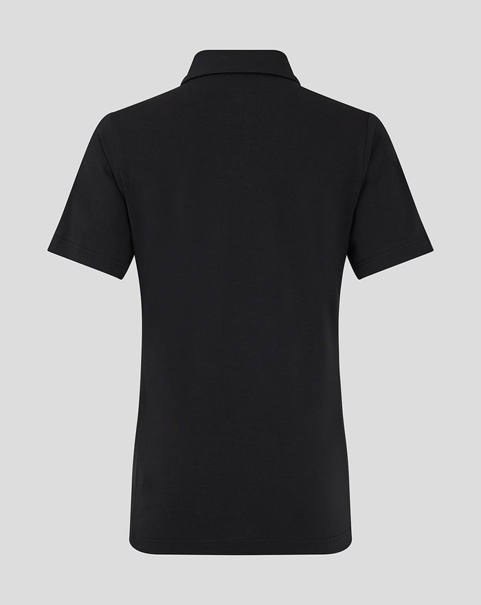 Back view of a black FC Twente Travel Polo for women showing the collar and short sleeves