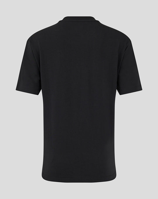 Achterkant van een zwarte FC Twente Travel T-shirt voor vrouwen met oversized pasvorm