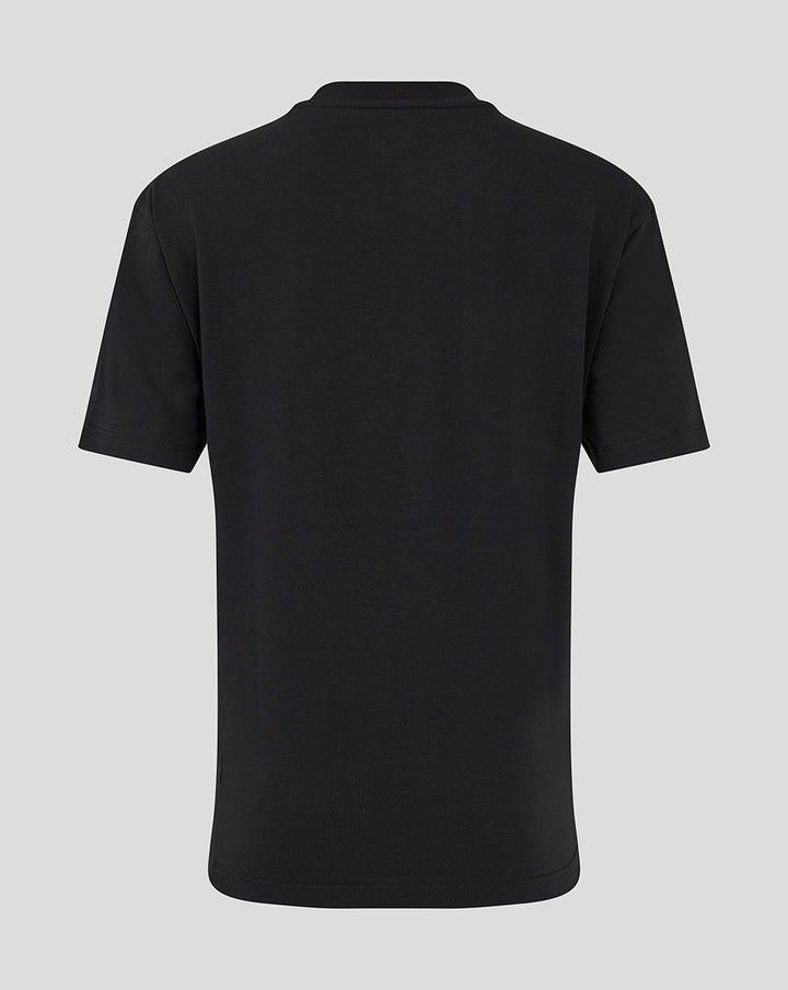 Achterkant van een zwarte FC Twente Travel T-shirt voor vrouwen met oversized pasvorm